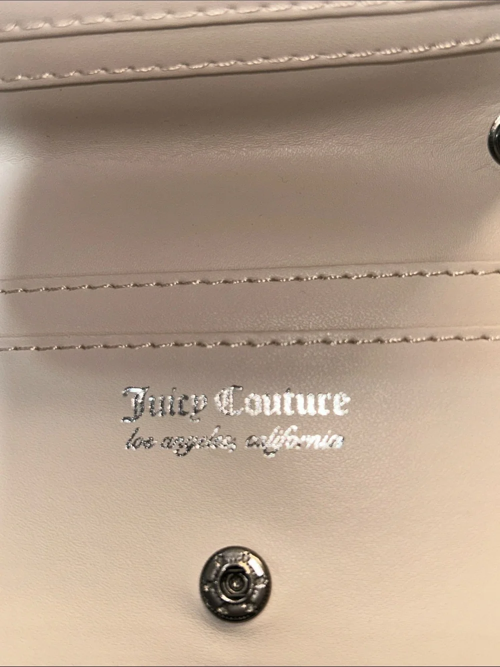 Juicy Couture compact embossed